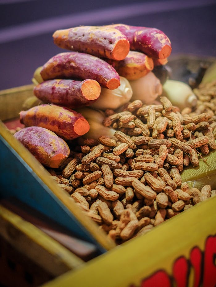 Boiled sweet potatoes and peanuts on a market stall in Jakarta, Indonesia.